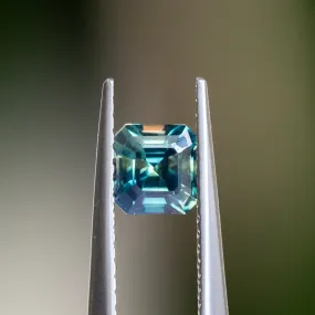 0.74CT ASSCHER CUT NIGERIAN SAPPHIRE, PARTI GREEN TEAL AND YELLOW, 4.95X4.91X3.24MM, UNTREATED