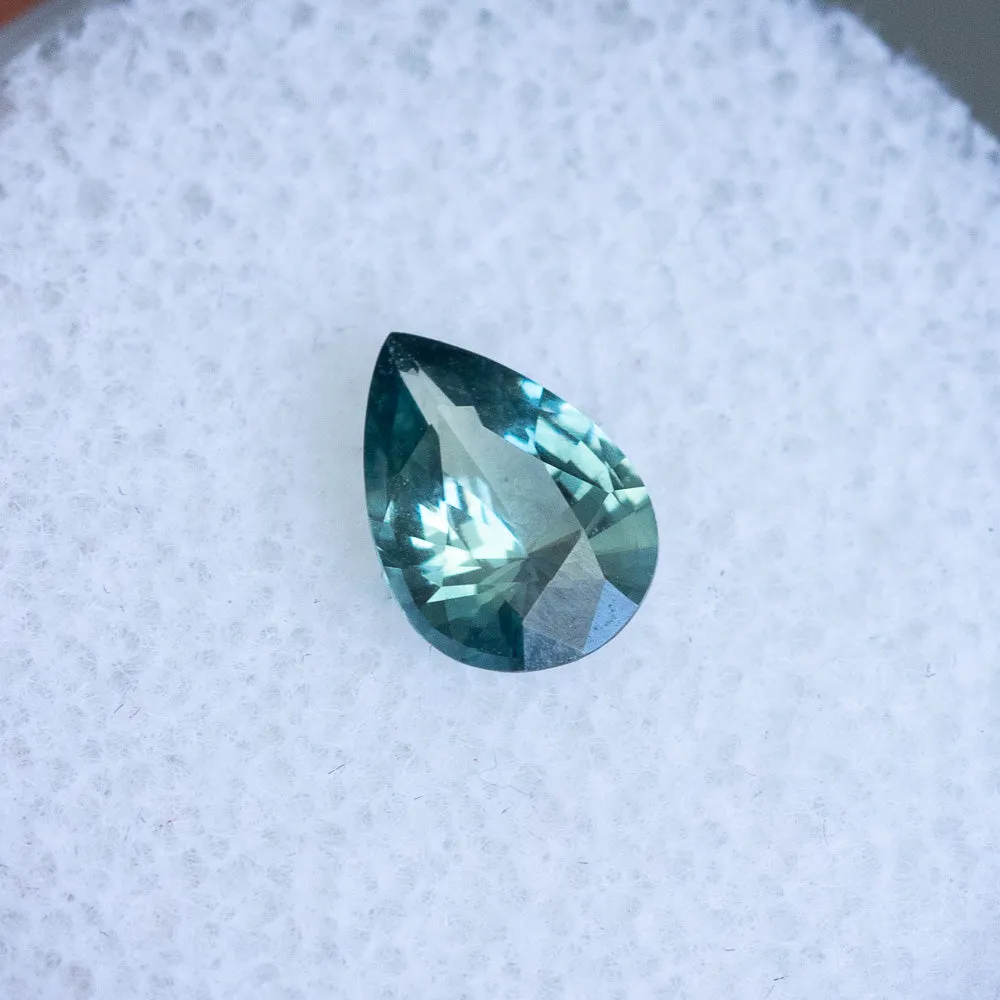 0.85CT PEAR MADAGASCAR SAPPHIRE, LIGHT TEAL BLUE, 7.56X5.43X3.21, UNHEATED