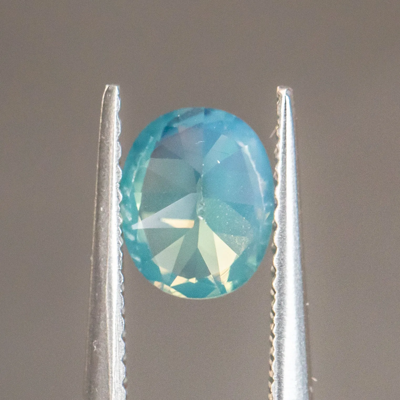 1.30CT OVAL GOMBE NIGERIAN SAPPHIRE, SILKY OPALESCENT TEAL, 6.98X5.66X4.02MM, UNTREATED