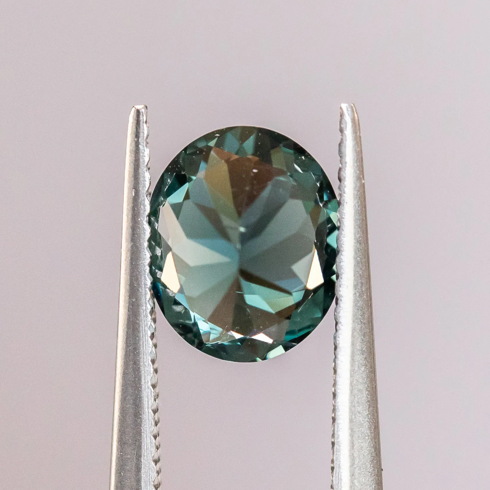 1.52CT OVAL MOZAMBIQUE SPINEL, TEAL BLUE, 8.0X6.7MM, UNTREATED